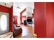 Spacious living room with high ceilings, hardwood floors, and abundant natural light at 60 Huddleston N Dr, Indianapolis, IN 46217