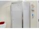 A shower with a glass door and walls and some wall decorations at 60 Huddleston N Dr, Indianapolis, IN 46217