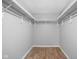 Spacious walk-in closet features built-in shelving and plenty of room for storage at 6205 Beech Grove Rd, Martinsville, IN 46151