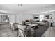 Open living room with modern furniture, decor and a large window at 6205 Beech Grove Rd, Martinsville, IN 46151