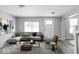 Bright and airy living room with a large sofa and modern decor at 6205 Beech Grove Rd, Martinsville, IN 46151