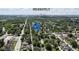 Aerial view of Indianapolis neighborhood with tree-lined streets and a blue house icon at 633 E 32Nd St, Indianapolis, IN 46205