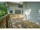 Large backyard deck with wood railing and white siding at 633 E 32Nd St, Indianapolis, IN 46205