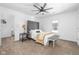 Inviting bedroom with a tufted headboard, neutral color scheme, and comfortable furnishings at 633 E 32Nd St, Indianapolis, IN 46205