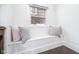 Cozy window seat with comfortable pillows and natural light at 633 E 32Nd St, Indianapolis, IN 46205