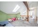 Open living room with skylights and cozy seating area; ideal for Gathering relaxation at 6348 Bay Vista E Dr, Indianapolis, IN 46250