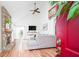 Bright living room with a stone fireplace, a comfortable gray sectional, and soaring ceilings at 6348 Bay Vista E Dr, Indianapolis, IN 46250