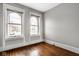 Empty bedroom featuring hardwood floors and abundant natural light at 643 Fort Wayne Ave # B & D, Indianapolis, IN 46204