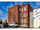 Brick apartment building with parking and sky view at 643 Fort Wayne Ave # B & D, Indianapolis, IN 46204