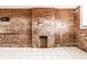 Living room with exposed brick wall with fireplace at 643 Fort Wayne Ave # B & D, Indianapolis, IN 46204