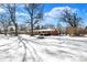 Spacious backyard with mature trees, providing a serene and private outdoor space at 6838 Hague Rd, Indianapolis, IN 46256