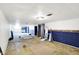 Spacious basement area features an open layout and blue accents, ready for renovation at 6838 Hague Rd, Indianapolis, IN 46256