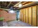 Basement featuring utilities, exposed ceiling, and potential for customization at 6838 Hague Rd, Indianapolis, IN 46256