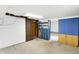 Unfinished basement with exposed ceiling, doorway, and potential for customization at 6838 Hague Rd, Indianapolis, IN 46256