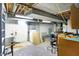 Basement featuring washer/dryer hookups, work space, and access to utilities at 6838 Hague Rd, Indianapolis, IN 46256