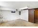 An unfinished basement with limited natural light and access to utilities at 6838 Hague Rd, Indianapolis, IN 46256