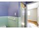 The bathroom offers a tiled shower stall and good lighting at 6838 Hague Rd, Indianapolis, IN 46256