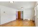 Bedroom with hardwood floors, closet, ceiling light and two entries at 6838 Hague Rd, Indianapolis, IN 46256