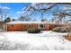 Charming brick home with a cozy, well-maintained exterior and snowy front yard at 6838 Hague Rd, Indianapolis, IN 46256