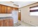 Kitchen featuring wood cabinets, countertops, and ample space for updates and customization at 6838 Hague Rd, Indianapolis, IN 46256