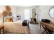 Bedroom with iron bed, desk, and minimalist decor at 720 Keck Way, Westfield, IN 46074