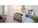 Bedroom with iron bed, desk, and minimalist decor at 720 Keck Way, Westfield, IN 46074