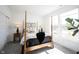 Bright bedroom featuring a four-poster bed, natural light, and plant in a woven basket at 720 Keck Way, Westfield, IN 46074