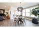 Bright dining room featuring a decorative light fixture and large windows at 720 Keck Way, Westfield, IN 46074