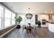 Well-lit dining room featuring large windows and decor lighting at 720 Keck Way, Westfield, IN 46074