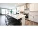 Spacious open-concept kitchen with island, seating and modern appliances at 720 Keck Way, Westfield, IN 46074