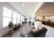 Spacious living area with lots of natural light, wood flooring, and modern design at 720 Keck Way, Westfield, IN 46074