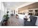 Living area featuring wood flooring, bright light, and a modern design aesthetic at 720 Keck Way, Westfield, IN 46074