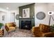 A cozy living room featuring a fireplace and comfortable seating at 720 Keck Way, Westfield, IN 46074