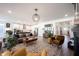 Open living space with modern furnishings and a view of the kitchen at 720 Keck Way, Westfield, IN 46074