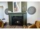 Close up of fireplace with stylish decor and seating at 720 Keck Way, Westfield, IN 46074