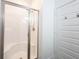 Walk-in shower featuring glass door, modern fixtures, and white interior at 720 Keck Way, Westfield, IN 46074
