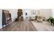 Cozy sitting room with neutral walls, wood-look floors, and stylish furniture at 720 Keck Way, Westfield, IN 46074
