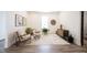 Serene sitting room with neutral decor, wood-look flooring, and a light filled interior at 720 Keck Way, Westfield, IN 46074