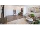 Spacious and bright sitting room featuring wood-look floors, neutral walls, and modern decor at 720 Keck Way, Westfield, IN 46074