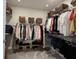 Organized walk-in closet featuring wire shelving and hanging rods for ample storage and organization at 720 Keck Way, Westfield, IN 46074