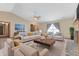 Bright living room featuring modern furniture, neutral tones, and a decorative fireplace at 7579 Allenwood Ct, Indianapolis, IN 46268
