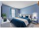 Inviting main bedroom with plush bedding, stylish accents, and a bright, airy ambiance at 7579 Allenwood Ct, Indianapolis, IN 46268