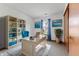Charming office with built-in shelves, a comfortable chair, and bright decor at 7579 Allenwood Ct, Indianapolis, IN 46268