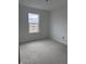 Bedroom with a window and ample space, providing a peaceful retreat at 7622 Sebastian Pl, Indianapolis, IN 46239