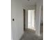 Hallway view of the home's bright, neutral color palette at 7622 Sebastian Pl, Indianapolis, IN 46239