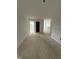 Open hallway featuring natural light and neutral paint, ready for personalization at 7622 Sebastian Pl, Indianapolis, IN 46239