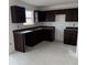 New kitchen featuring dark cabinets and a window, perfect for meal preparation at 7622 Sebastian Pl, Indianapolis, IN 46239