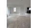 Spacious living room with neutral walls and natural light, ideal for entertaining at 7622 Sebastian Pl, Indianapolis, IN 46239