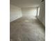 A spacious living room with bright natural light from a window at 7622 Sebastian Pl, Indianapolis, IN 46239