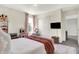 Cozy bedroom featuring a comfortable bed, playful decor, and a closet for ample storage at 8148 Ebaugh Dr, Camby, IN 46113